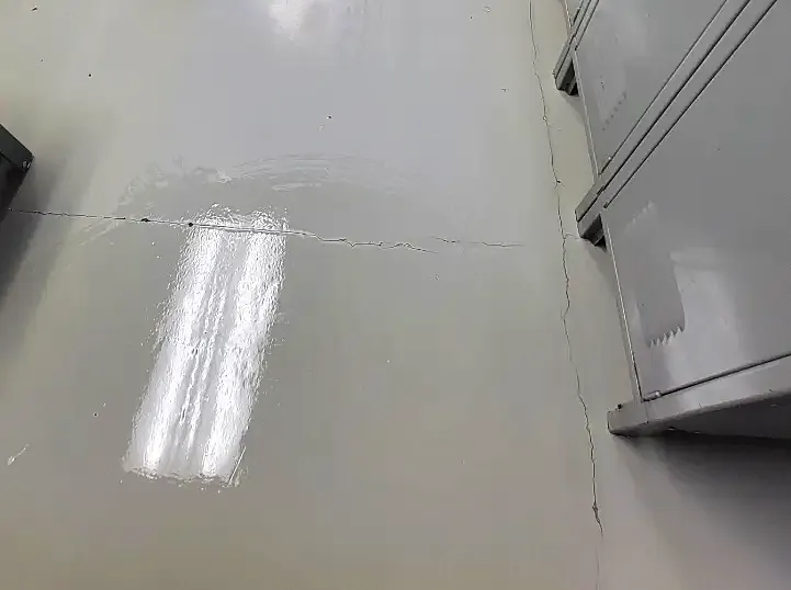 After: grey floor beside a row of lockers